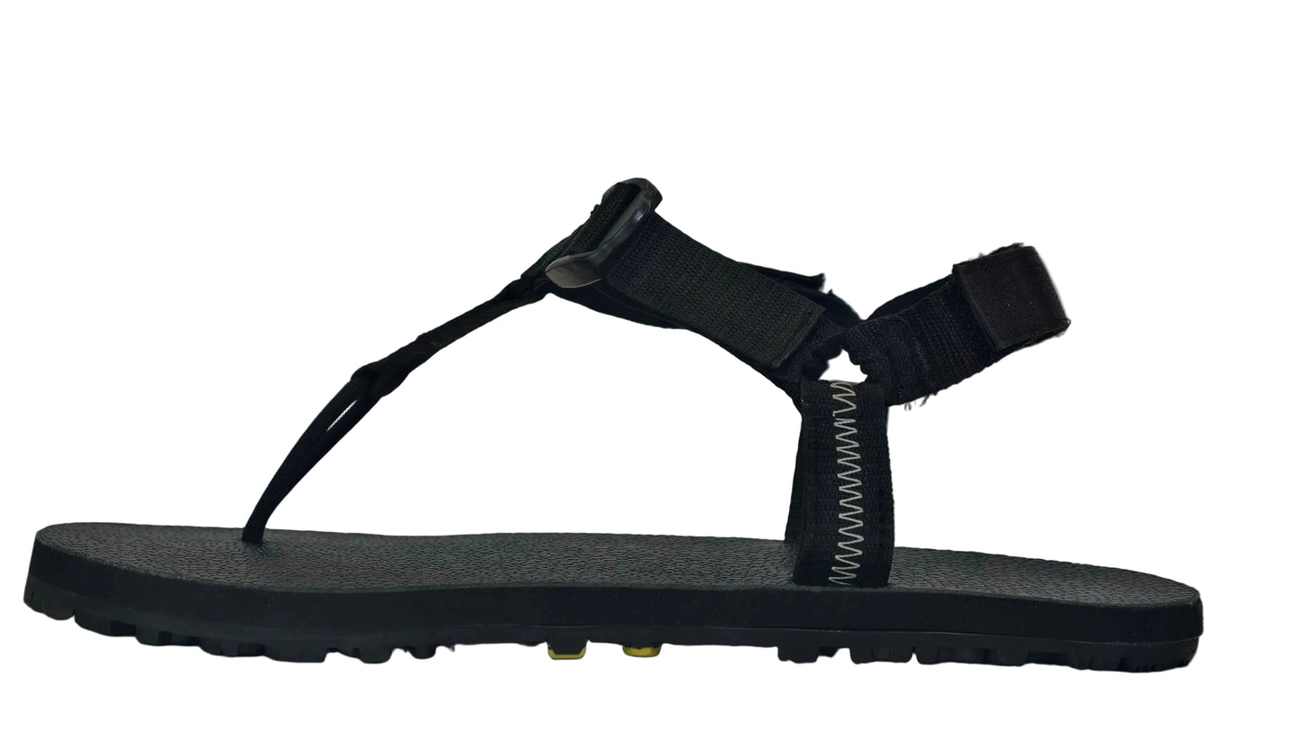 Side view showing grounded talons seen on the minimalist sandals