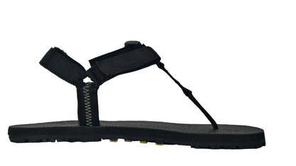 Side view showing grounded talons with buckle seen on the minimalist sandals
