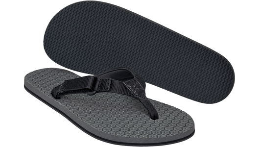 Primal barefoot slippers with rubber traction sole and hexagonal weave air cushion with padded strap for chafeless wear throughout the day